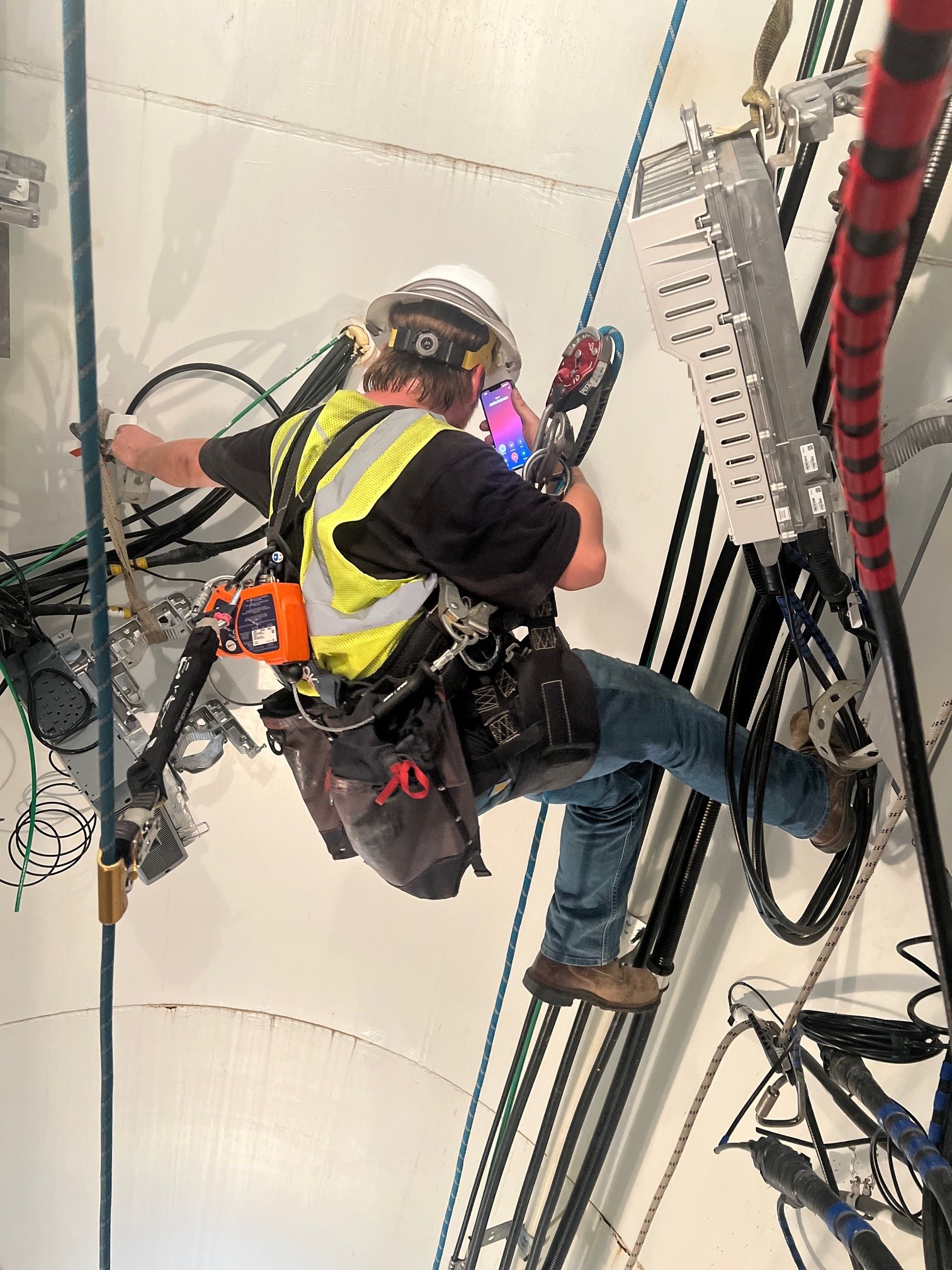 One Way Tower Tech helps out in the weekend, inside a water tank.