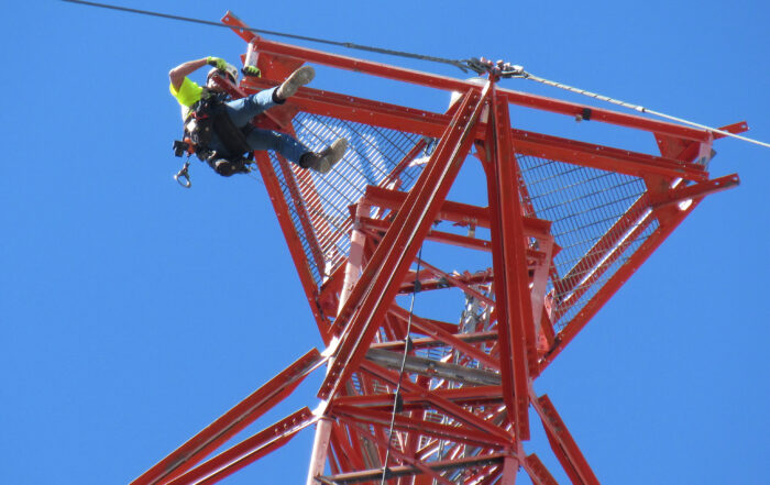 One Way Wireless Construction Tower Tech out checking for loose hanging hardware to keep people safe in Grand Junction, CO.