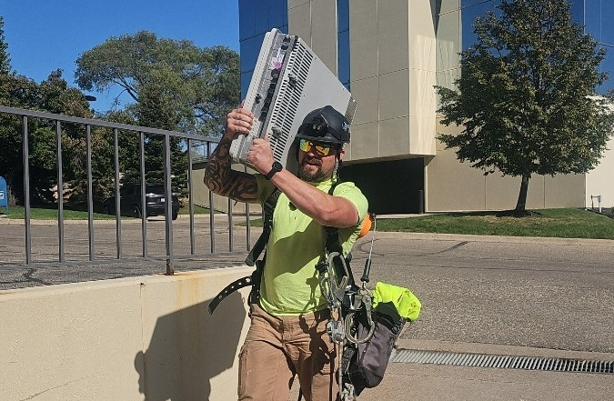 One Way Wireless Tower tech brings equipment to the site.