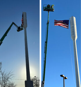 Tower work turns to unfurling flag in St. Louis, MO